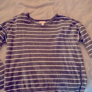 Long sleeve black and white with side zip.